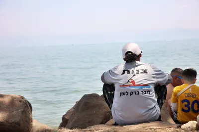 "Team in memory of Barak Lufan," watching the flotilla